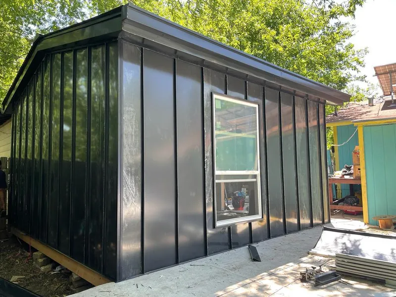 Black standing seam metal wall panels for Roof Inspection in Wood-Ridge