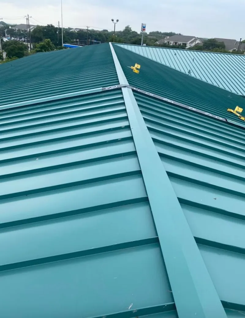 Green commercial metal roof ridge and valley for Metal Roof Repair in Wood-Ridge